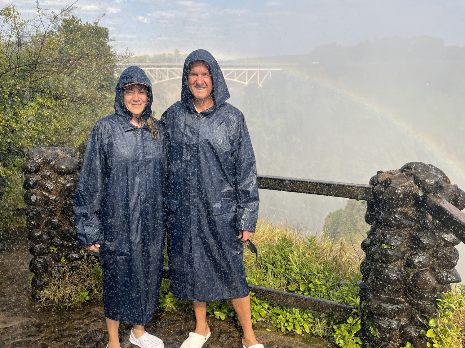 M&K in raincoats