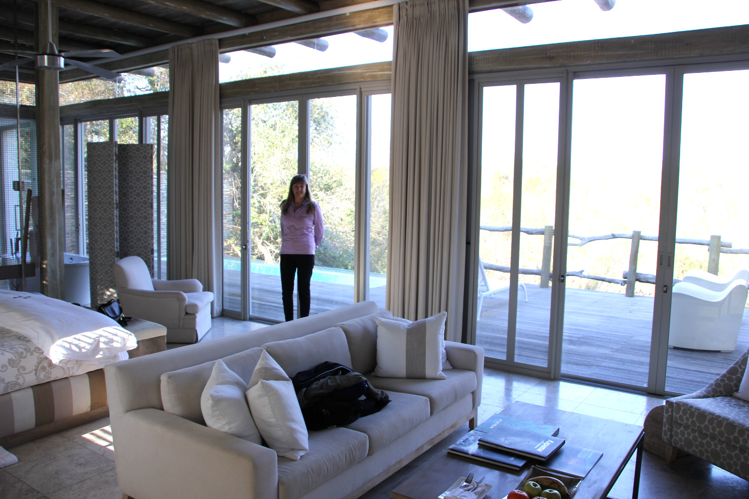 Kathy in front of balcony
